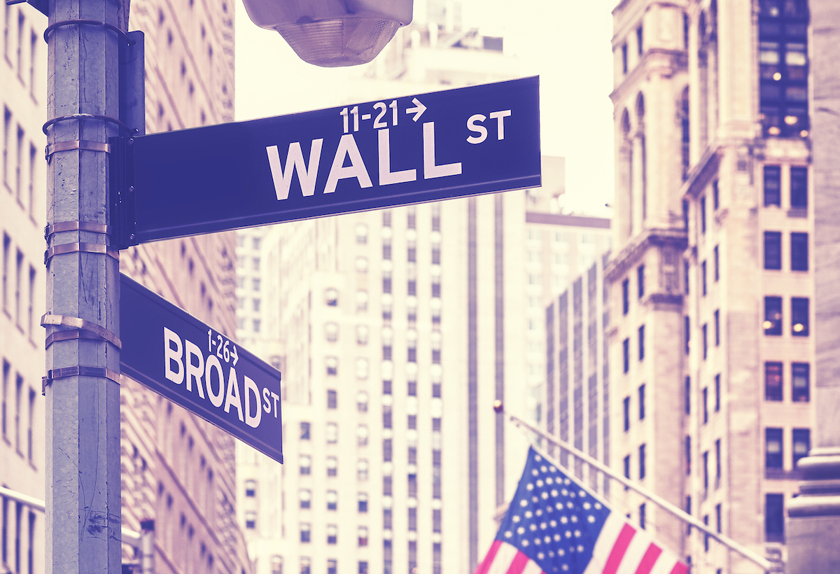 Wall Street and Broad Street signs, color toning applied, New York City, USA.