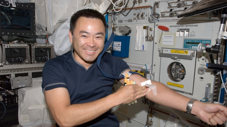 Expedition 32 Flight Engineer Akihiko Hoshide after undergoing a generic blood draw in the European Laboratory/Columbus Orbital Facility. Duke engineers are building a robot that would replace the need for specialized astronaut training to access a vein for a blood draw or to administer fluids or medication. Photo: Courtesy of NASA