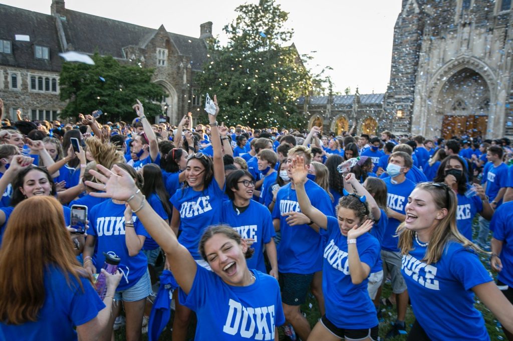 Students enjoy the Blue Devil Return, an all-campus welcome back carnival on the Abele Quad featuring a variety of inflatables, games, a movie on the lawn, an array of carnival food, and fireworks. Uniquely special to the evening, the class of 2024 gets together for a unique photo opportunity in front of Duke Chapel.
